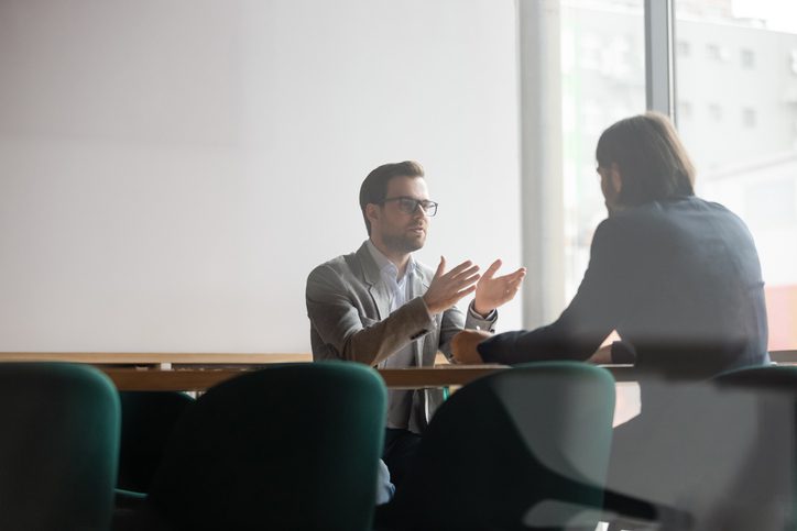 businessman providing employee feedback