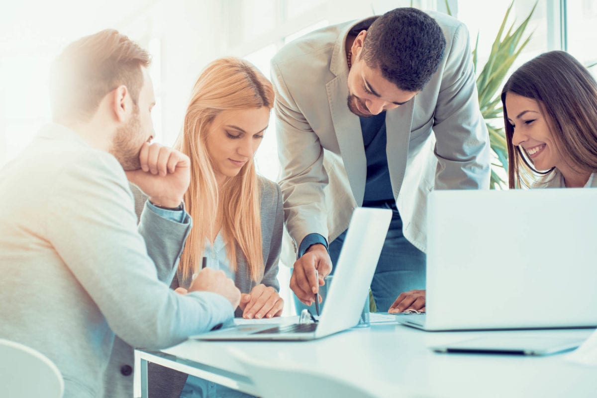 Successful business group working at the office.